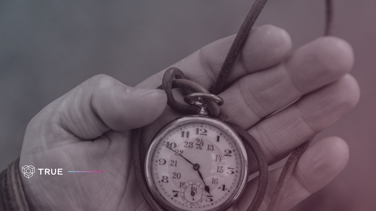 an antique pocket watch resting in an open hand, the kind of item whose certificate of authenticity transfers to a new owner