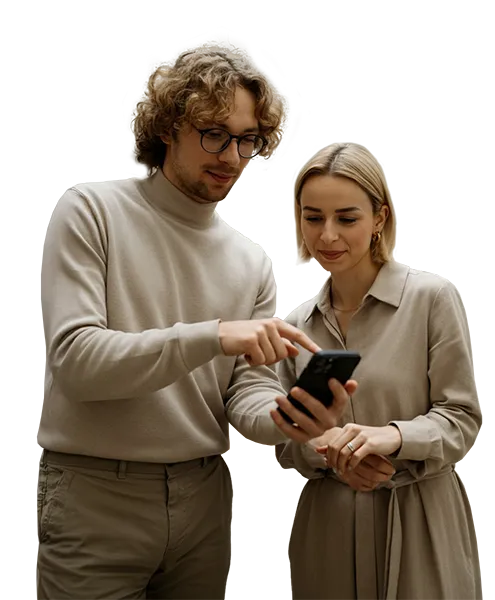 Smiling man and woman standing together reviewing a smartphone screen, collaborating on mobile document verification